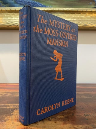 Item #5860 The Mystery at the Moss-Covered Mansion. Carolyn Keene